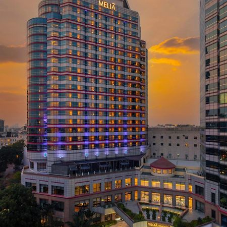 Melia Hanoi Exterior photo The hotel at sunset