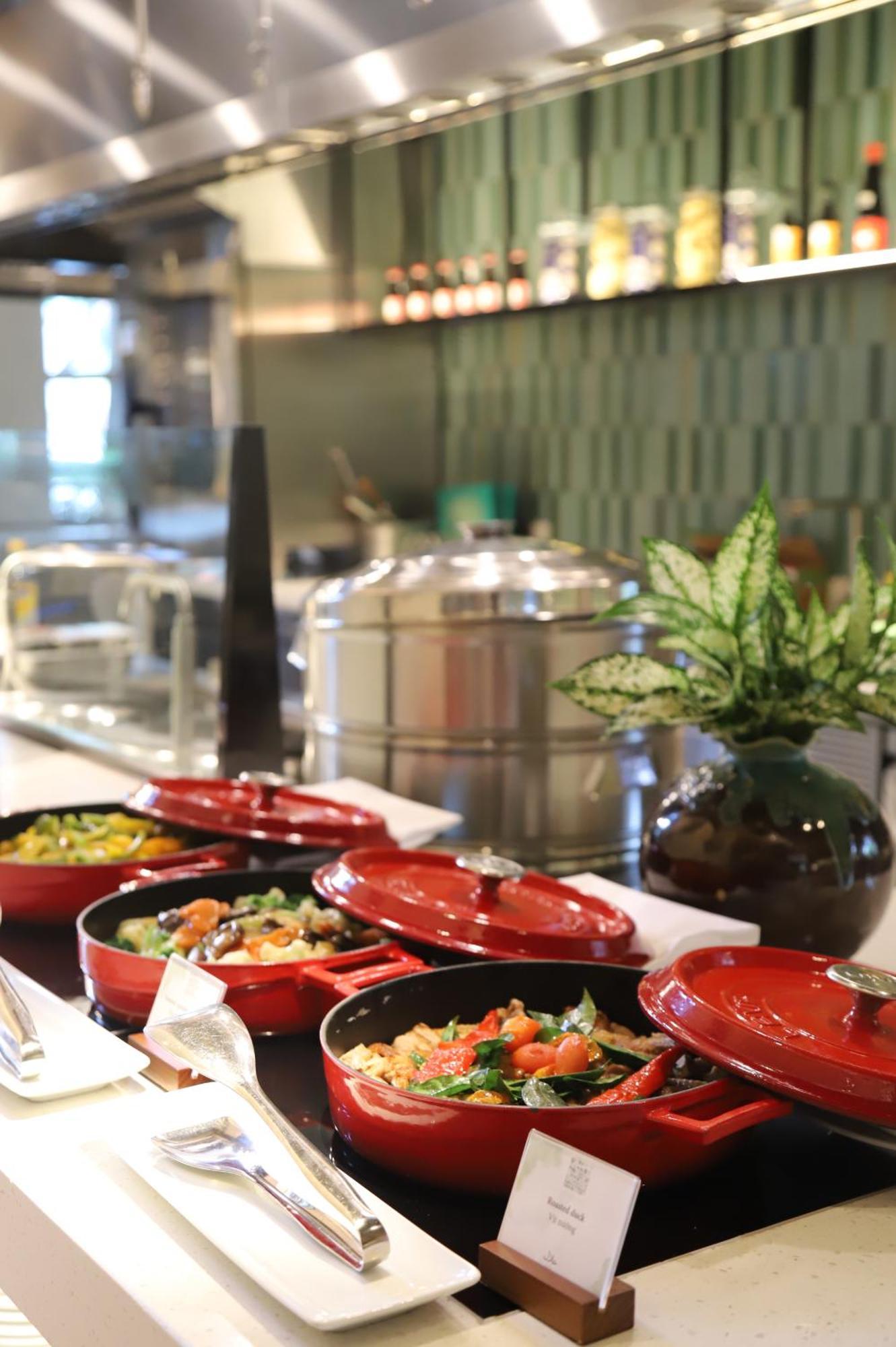 Melia Hanoi Exterior photo A buffet at a hotel