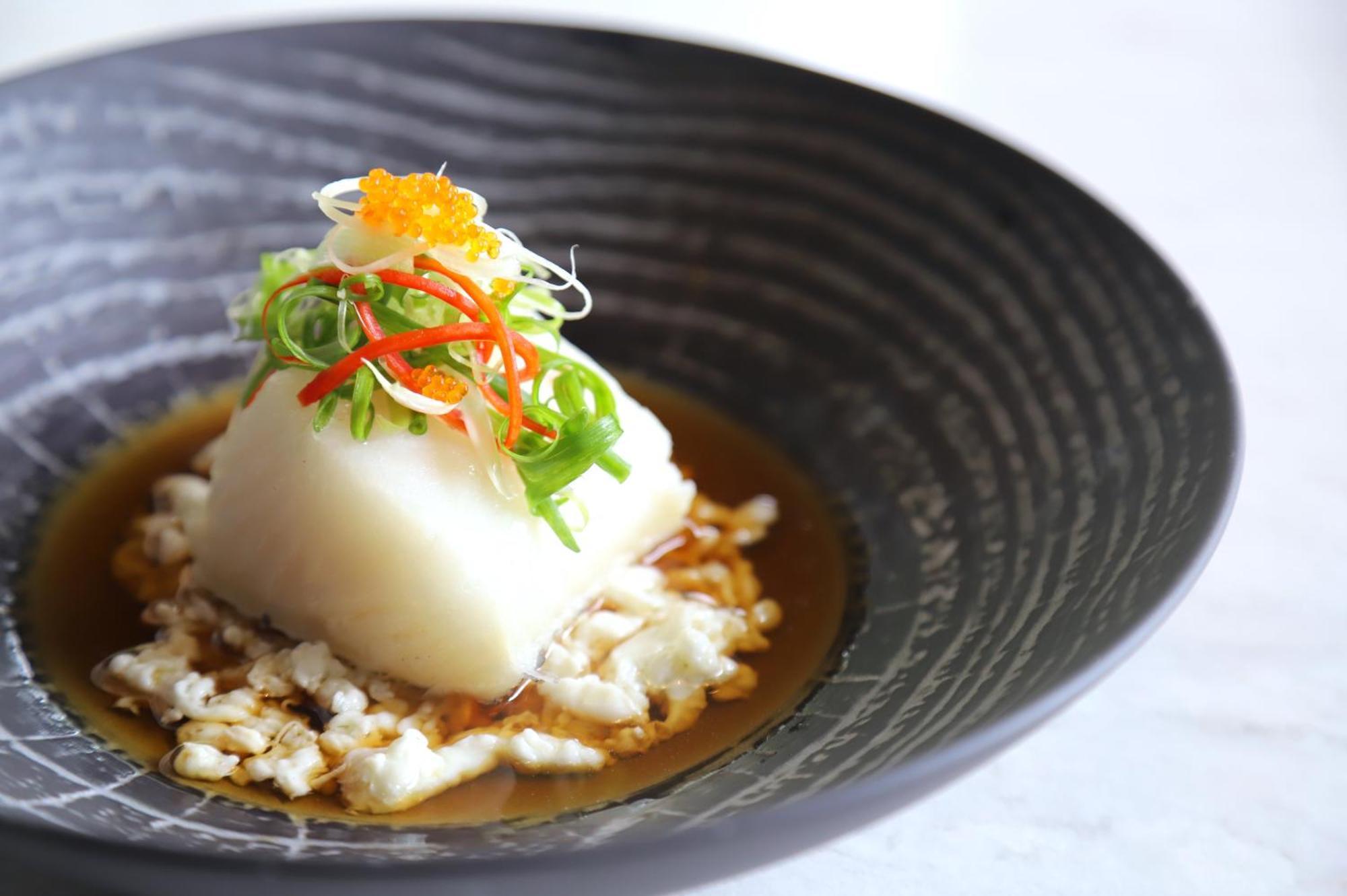 Melia Hanoi Exterior photo A bowl of tofu